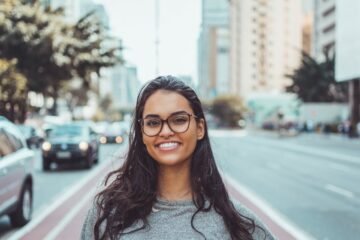 smiling women with glasses